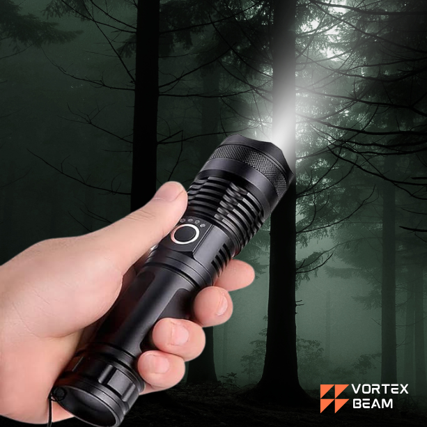 A black Vortex flashlight held in hand is illuminating the forest.